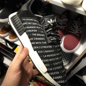 the brand with the three stripes laces